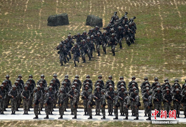 PLA holds military drill in HK, locals invited to observe