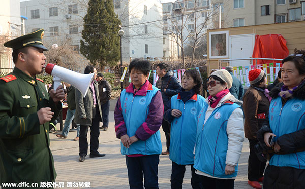 Eagle-eyed Xicheng <EM>dama</EM> keep streets of Beijing district safe