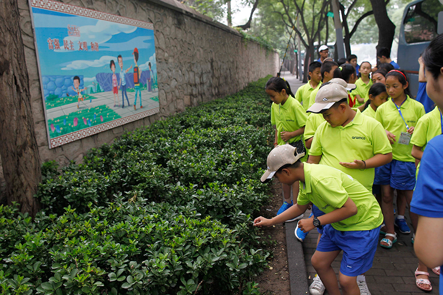 Left-behind children from remote areas visit Beijing