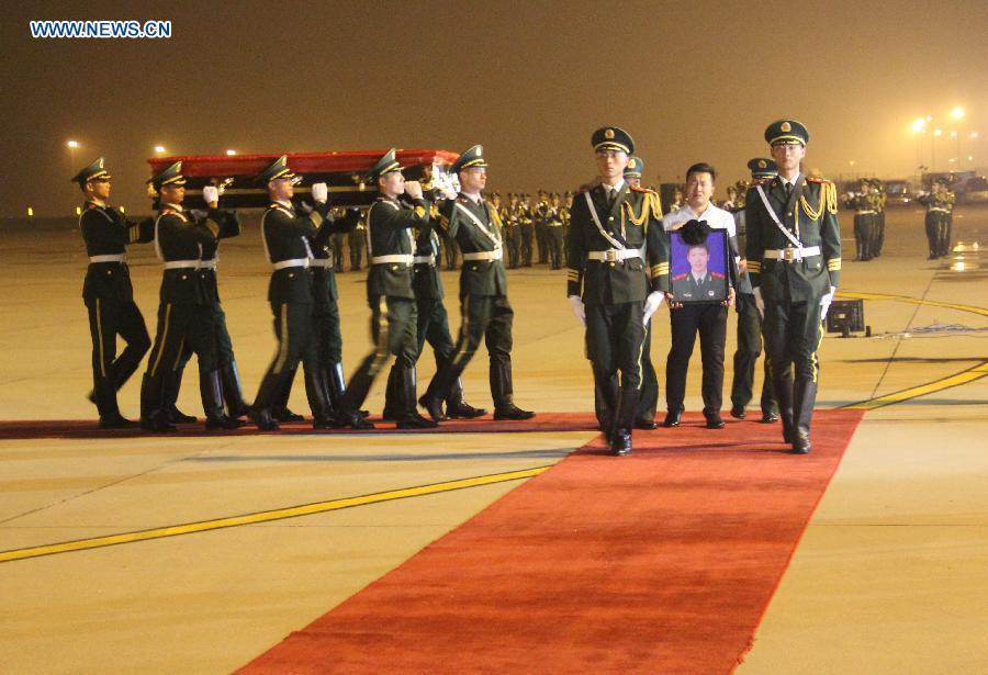 Remains of Chinese guard killed in Somalia attack return home