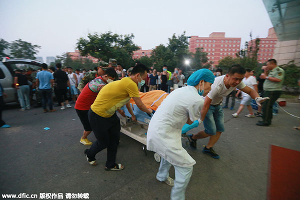 Loved ones look for explosion victims