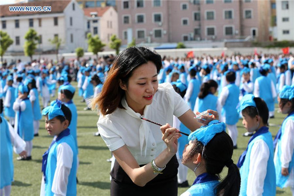 New first-graders attend traditional education activity