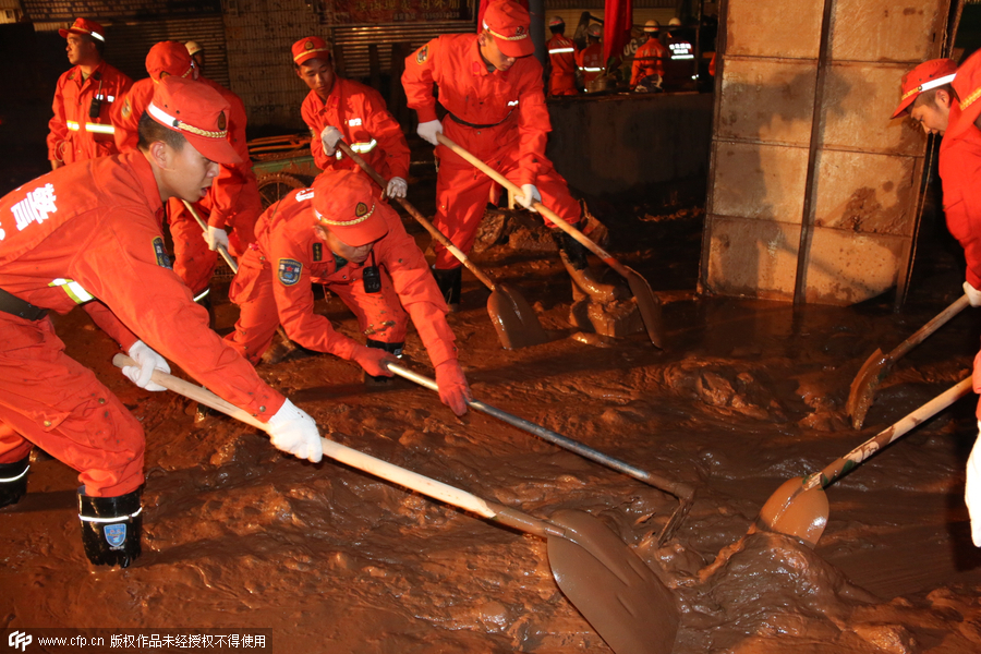 Eleven killed as rainstorm triggers landslide in SW China