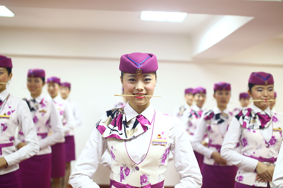 Stewardesses trained to show sweet smile