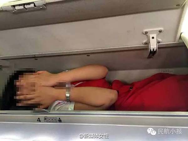 Photos of stewardesses in overhead luggage lockers spark disputes