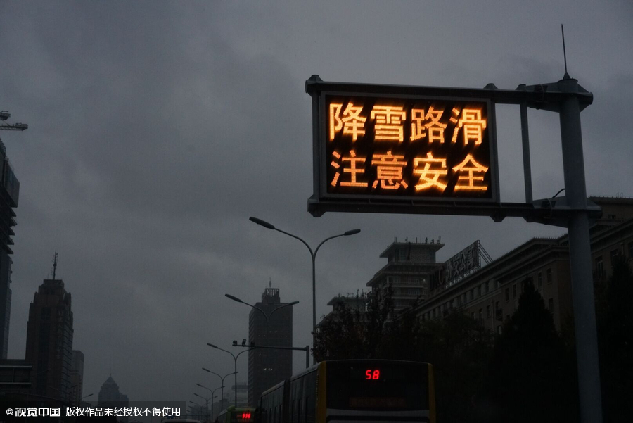 Beijing embraces first snow of the season