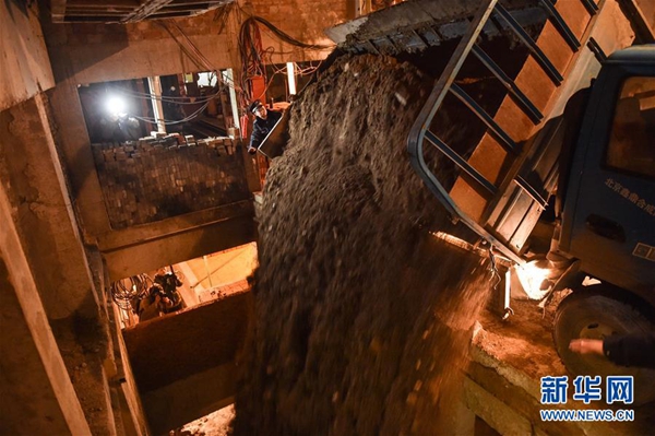 Huge illegal basement being backfilled in downtown Beijing