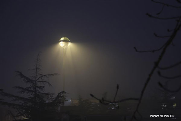 Smog shrouds Beijing