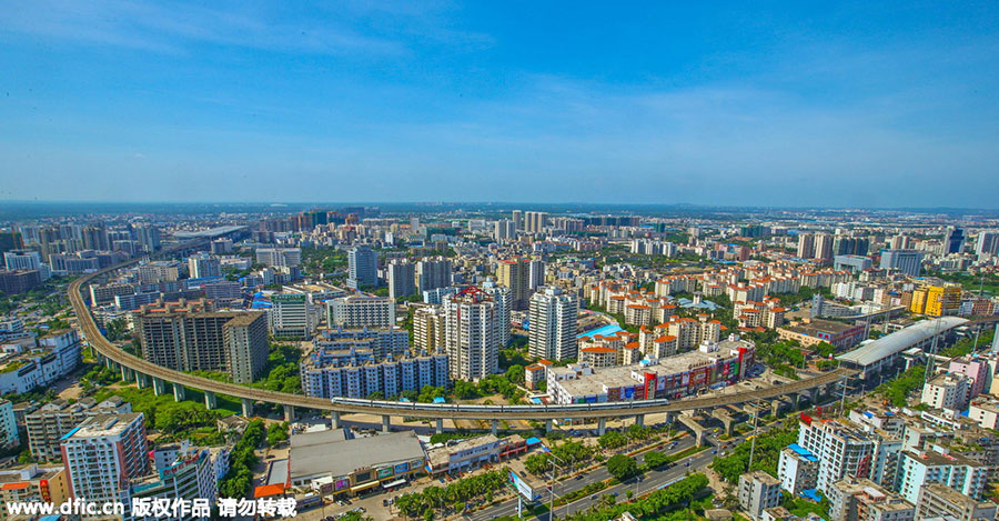 World's first high-speed train line circling an island opens in Hainan