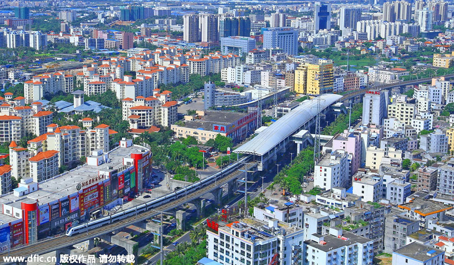 World's first high-speed train line circling an island opens in Hainan