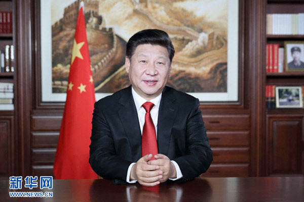 Xi highlights poverty reduction, int'l role in New Year speech