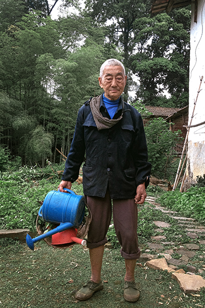 Grandfather serves as photographer's muse