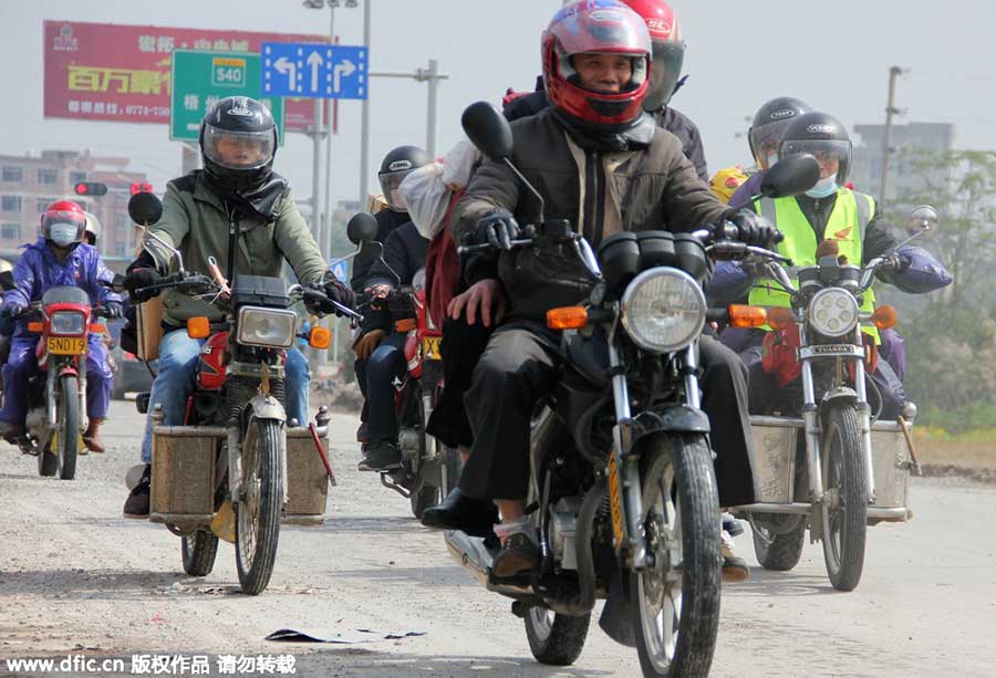 Migrant workers riding motorcycles home for Spring Festival reunion