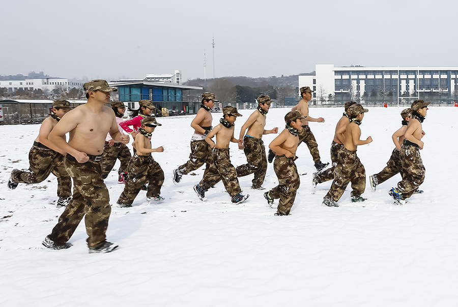 Topless children in wintry cold raises online furor