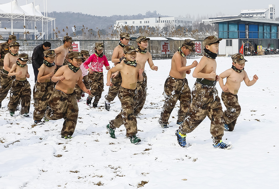 Topless children in wintry cold raises online furor