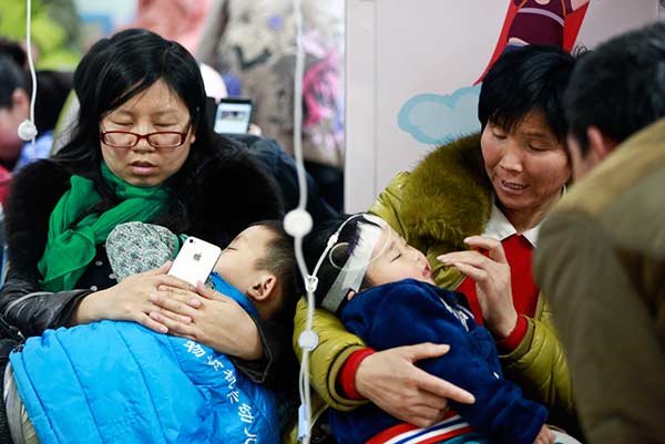 Thousands of kids fall ill with flu in Beijing
