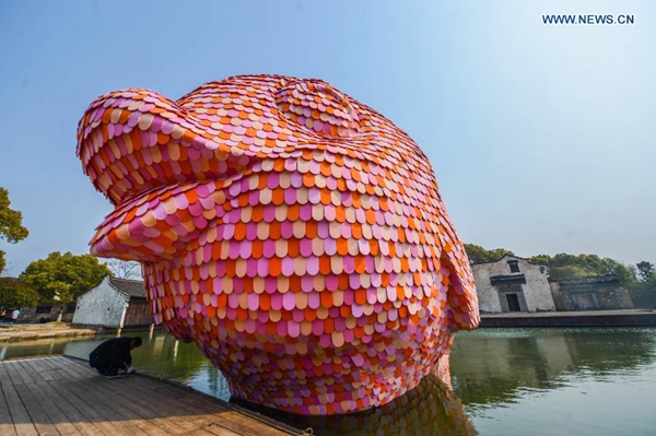 Pink fish makes a splash in ancient town