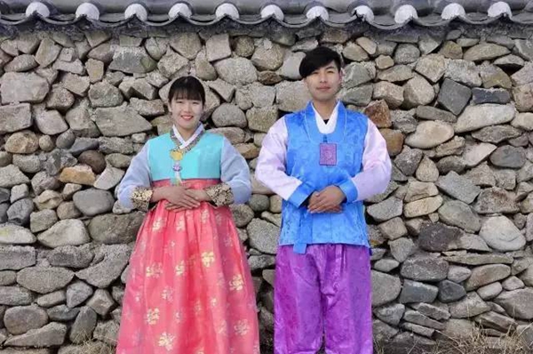 Couple on epic wedding trip to don 56 ethnic costumes