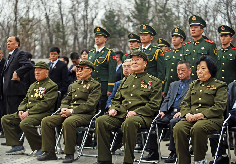 China holds burial ceremony for soldier remains returned from ROK