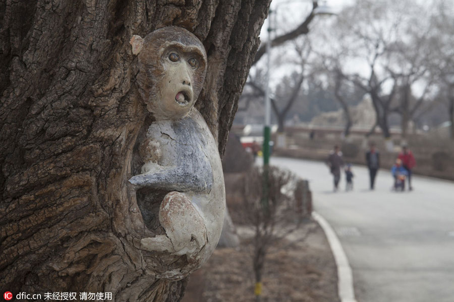 Carved figures emerge from trees in Northeast China