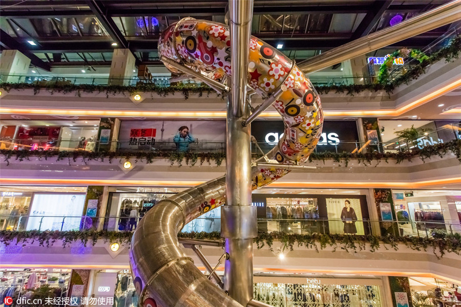 Spiral tube slide opens in Shanghai shopping mall