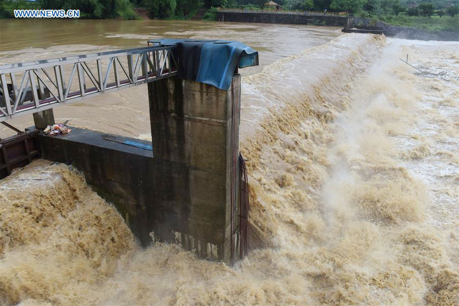 torrential,richter scale torrential rainfall triggers flash flood in china