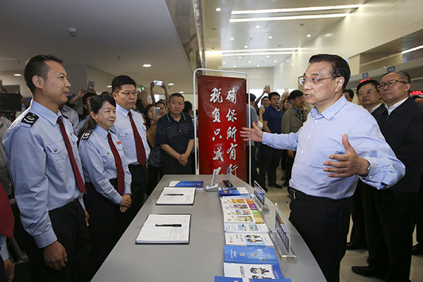 Premier Li: Ensure tax burdens are eased in all industries