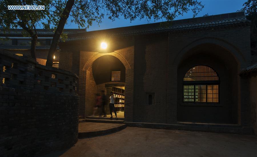 Library modified from cave dwellings attracts readers in NW China