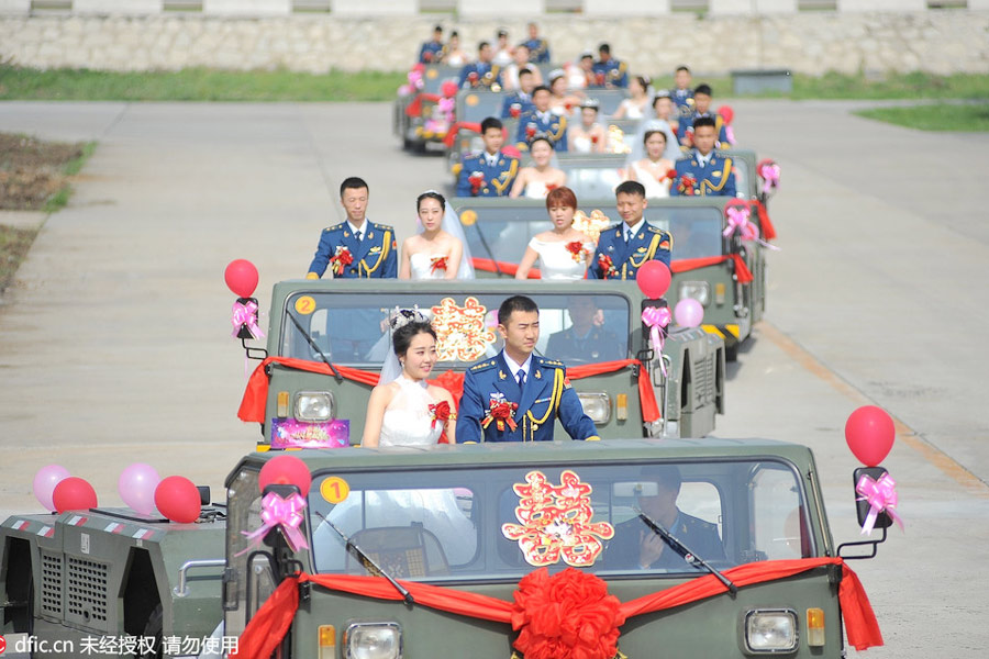 Military-style wedding: Fighter jets, grooms in dashing uniforms