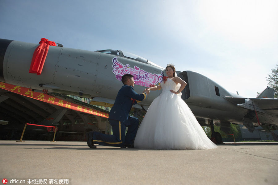 Military-style wedding: Fighter jets, grooms in dashing uniforms