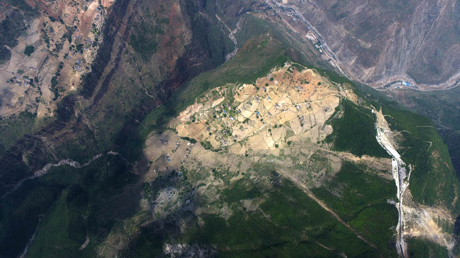 Children scale 800-meter cliff on way to school