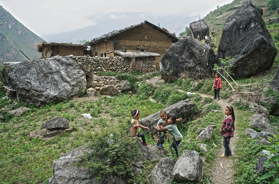 Children scale 800-meter cliff on way to school