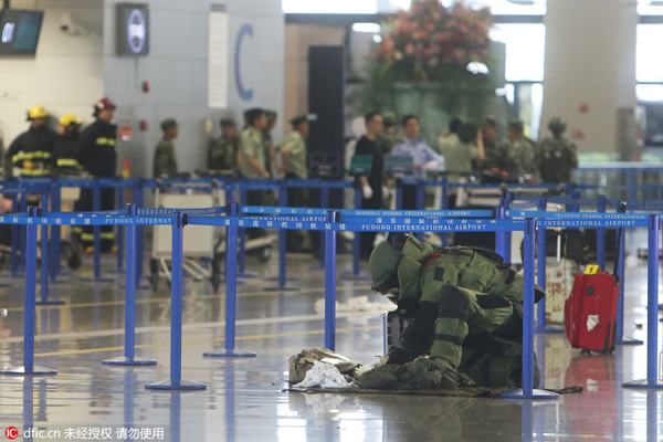 Homemade bombs hurt four at Shanghai airport