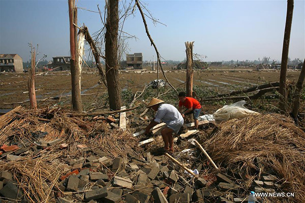 Chinese tornado, hailstorm death toll hits 99