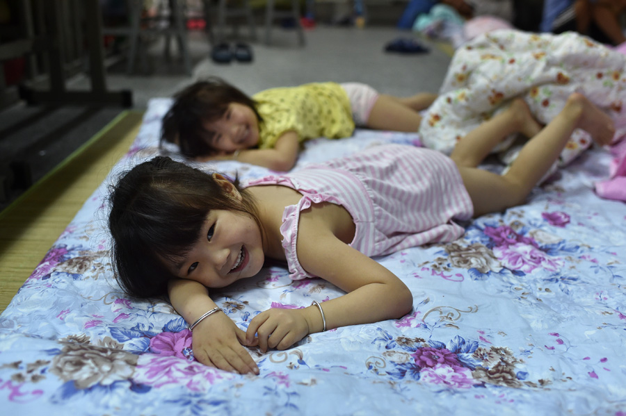 Life at the makeshift settlement for the flood