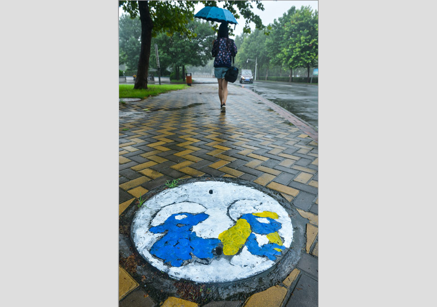 Luoyang university gets cartoon manhole covers