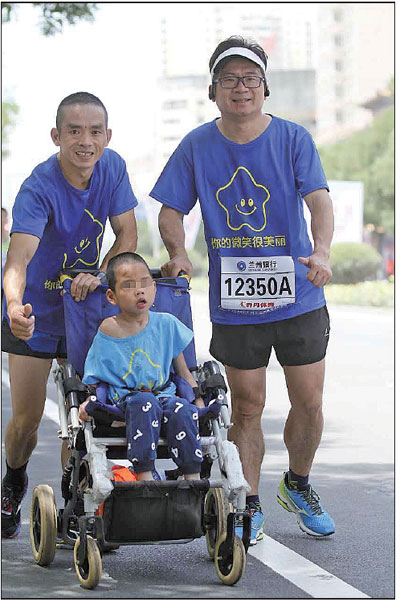 Marathon dad runs with son