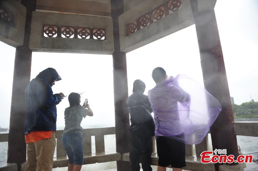 Sports venue turns makeshift shelters as Typhoon Nida lashes Shenzhen