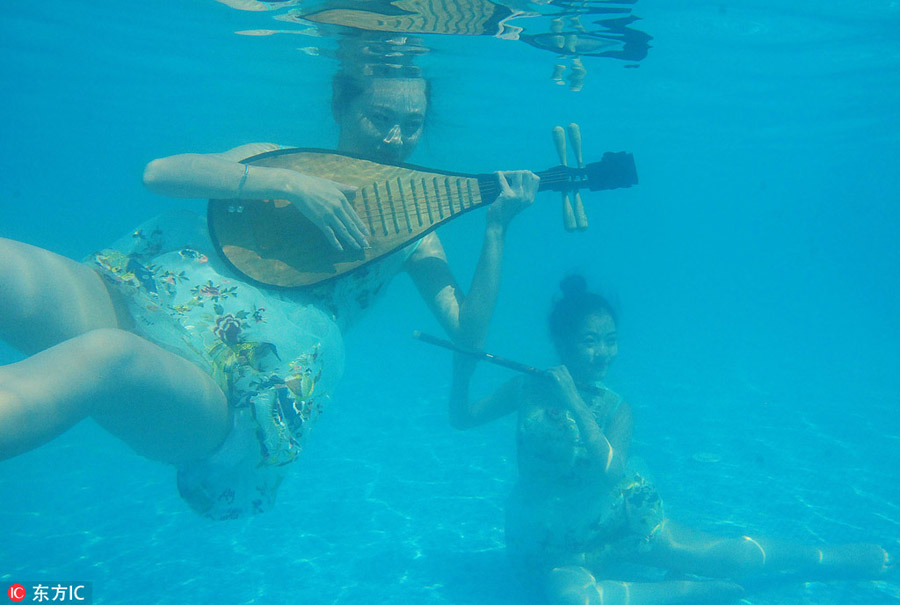 Underwater show cheers for Olympians