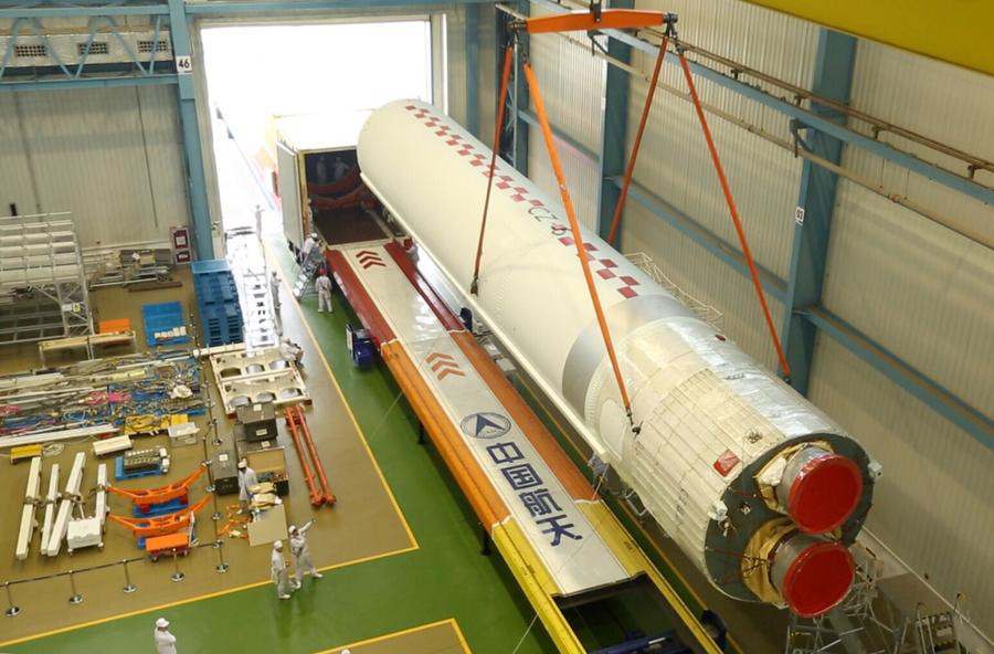 Long March-5 rocket leaves for launch site