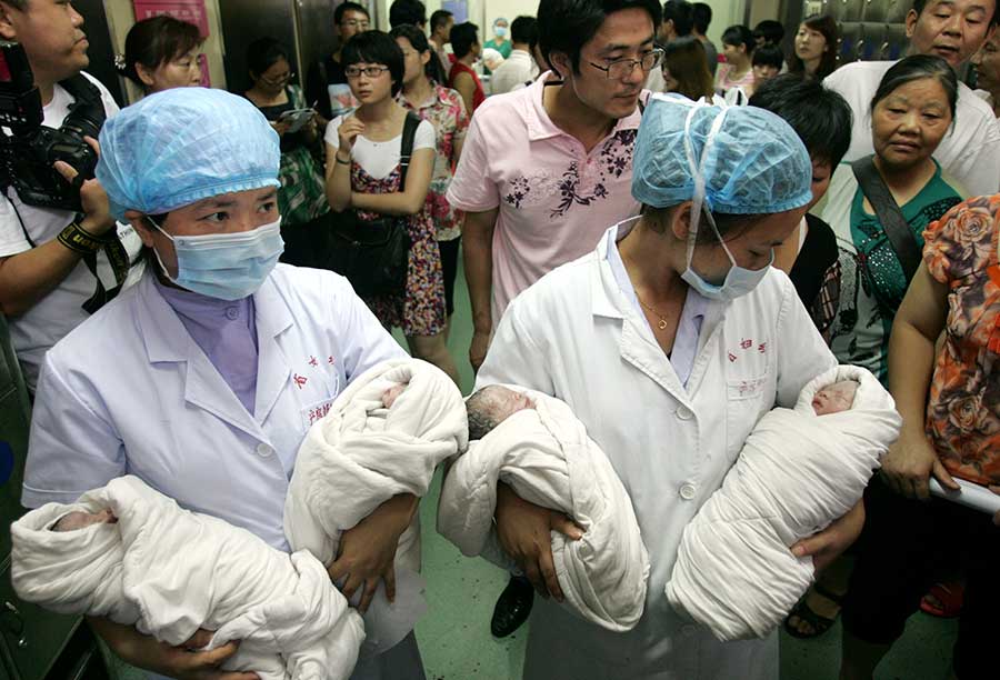 Four of a kind: Quadruplets get ready for school in Changsha