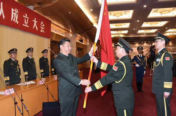 China sets up joint logistics force, Xi confers flags