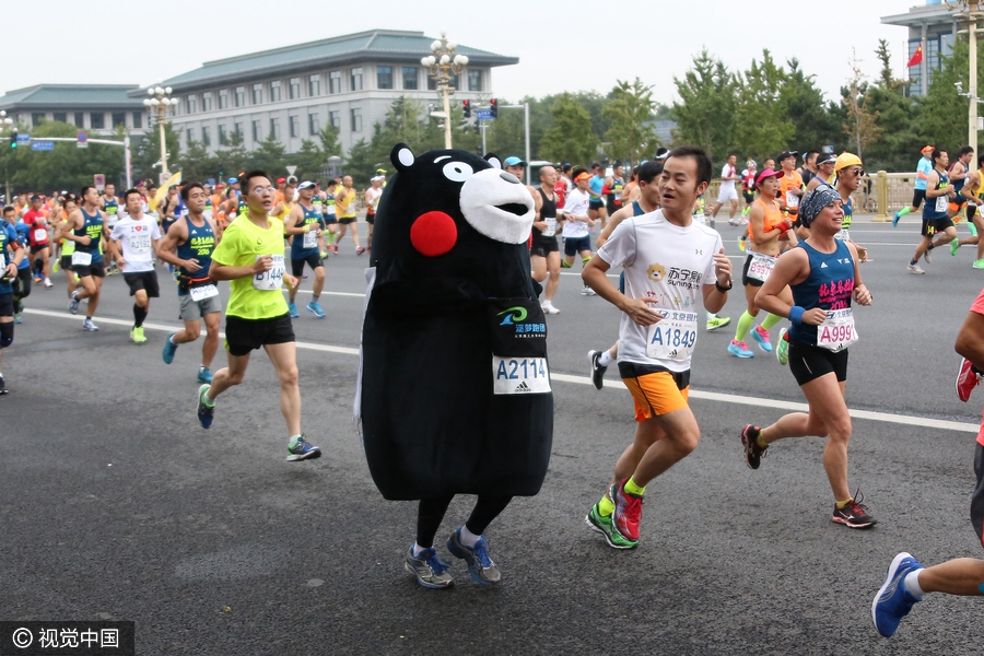 Runners compete during Beijing marathon