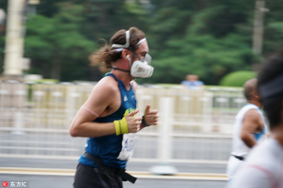 Runners compete during Beijing marathon