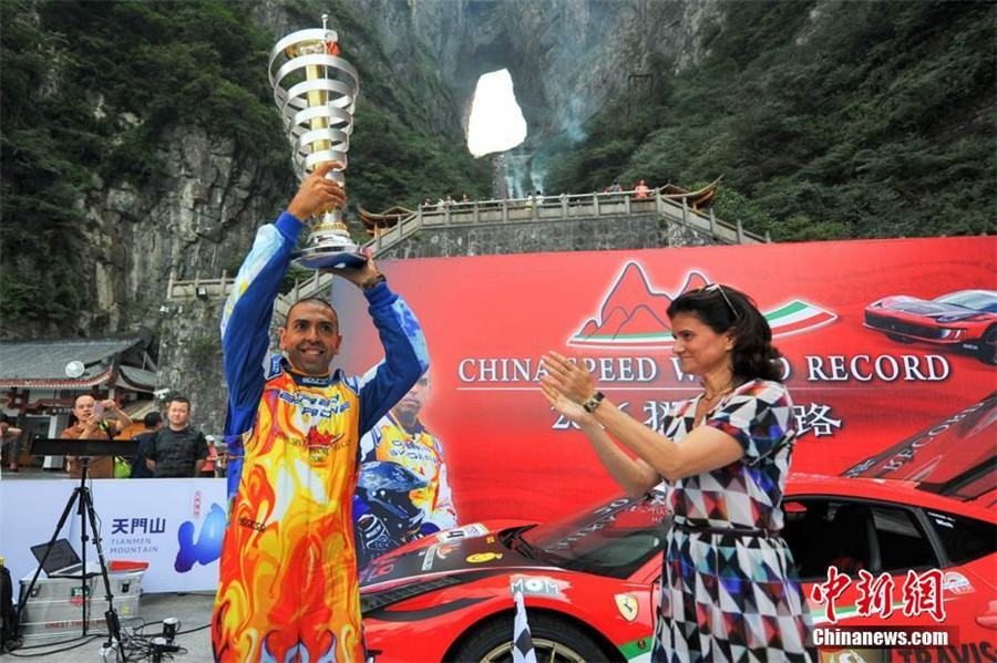 Italian sets new record with Ferrari on China's 'miracle road'