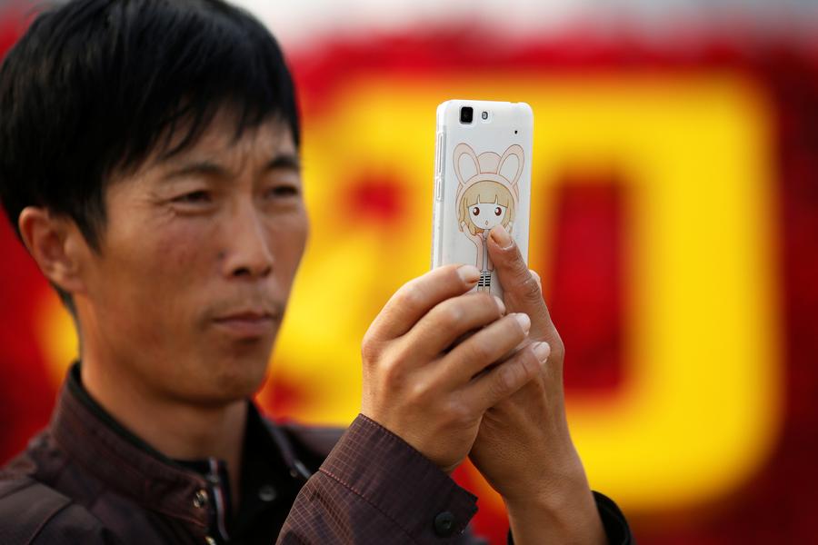 New China, new era: Selfies mark National Day