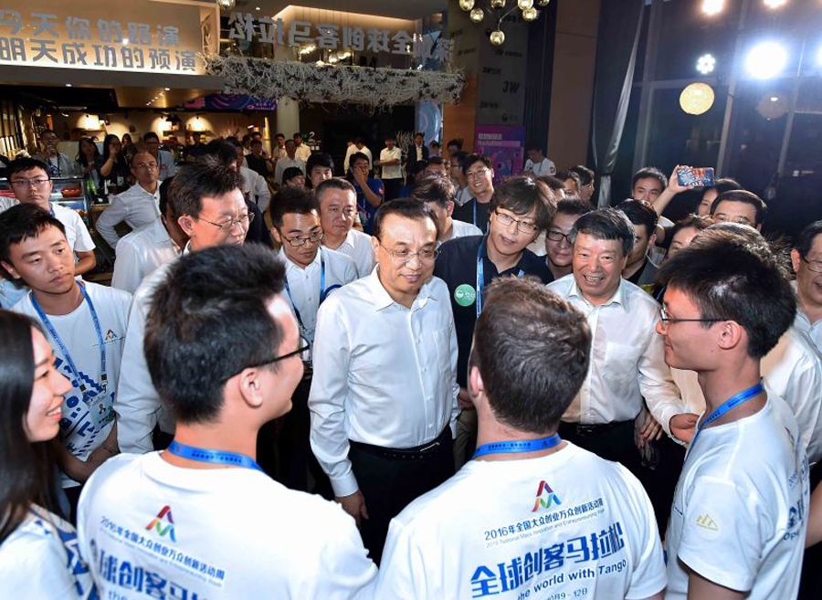 Li vows anew to ease market access