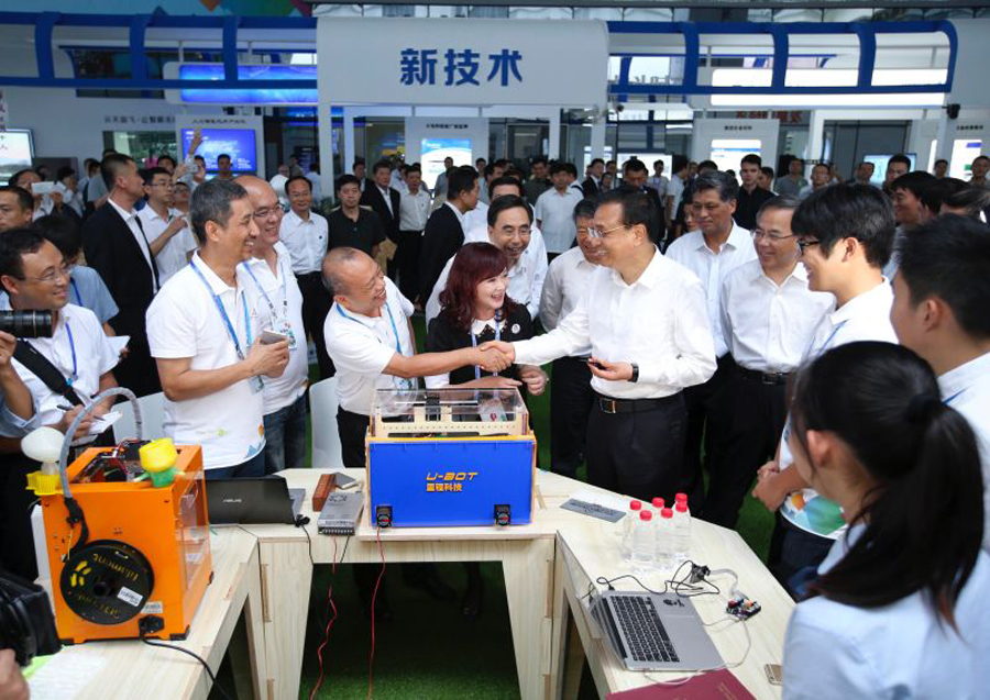 Li vows anew to ease market access
