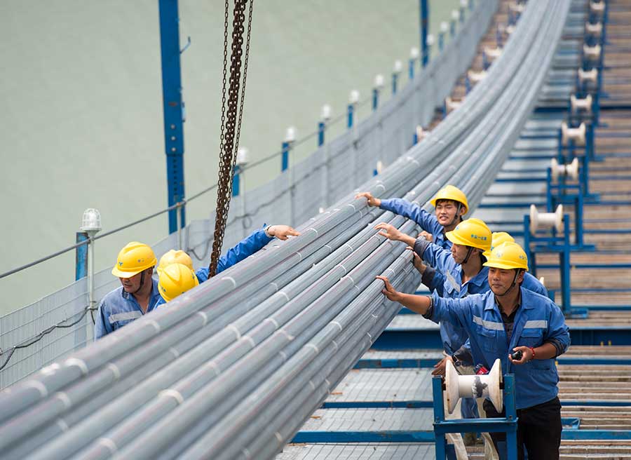 Longest suspension bridge achieves milestone