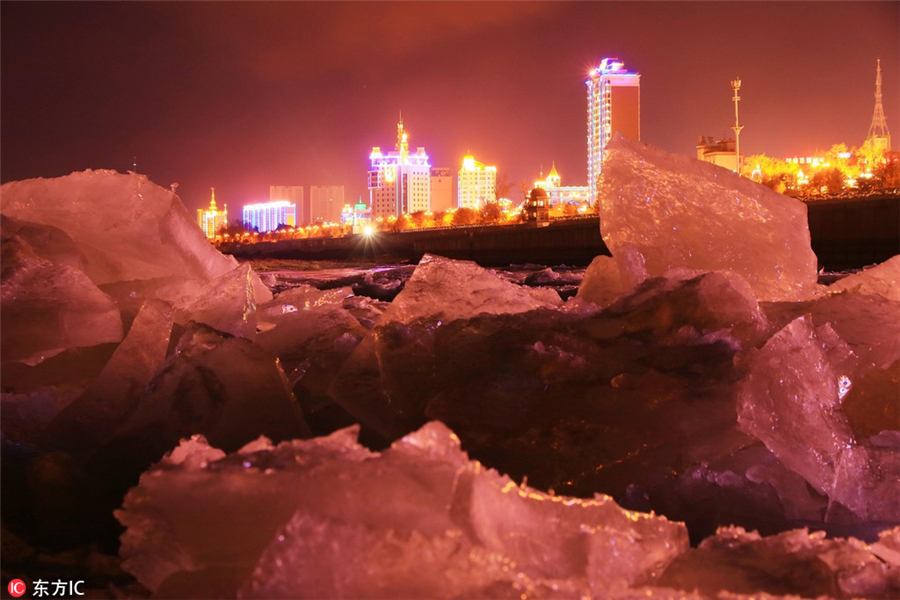 Ice sparkles under dazzling colors in Heilongjiang
